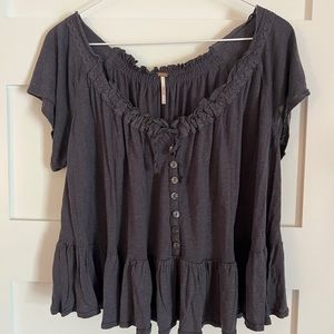 Free people distressed blue casual top, size small but slightly oversized